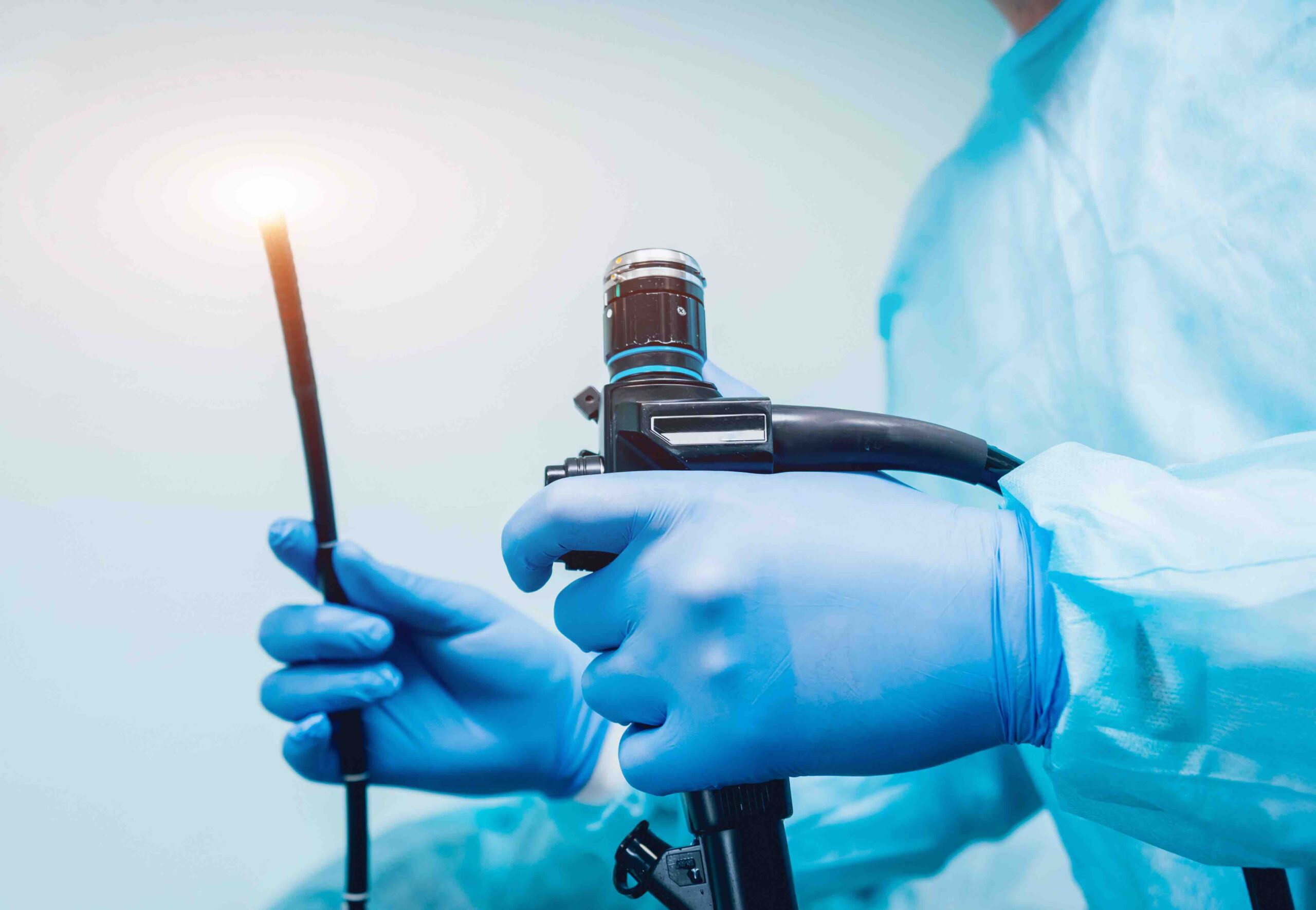 Endoscopy at the hospital. Doctor holding endoscope before gastroscopy. Medical examination