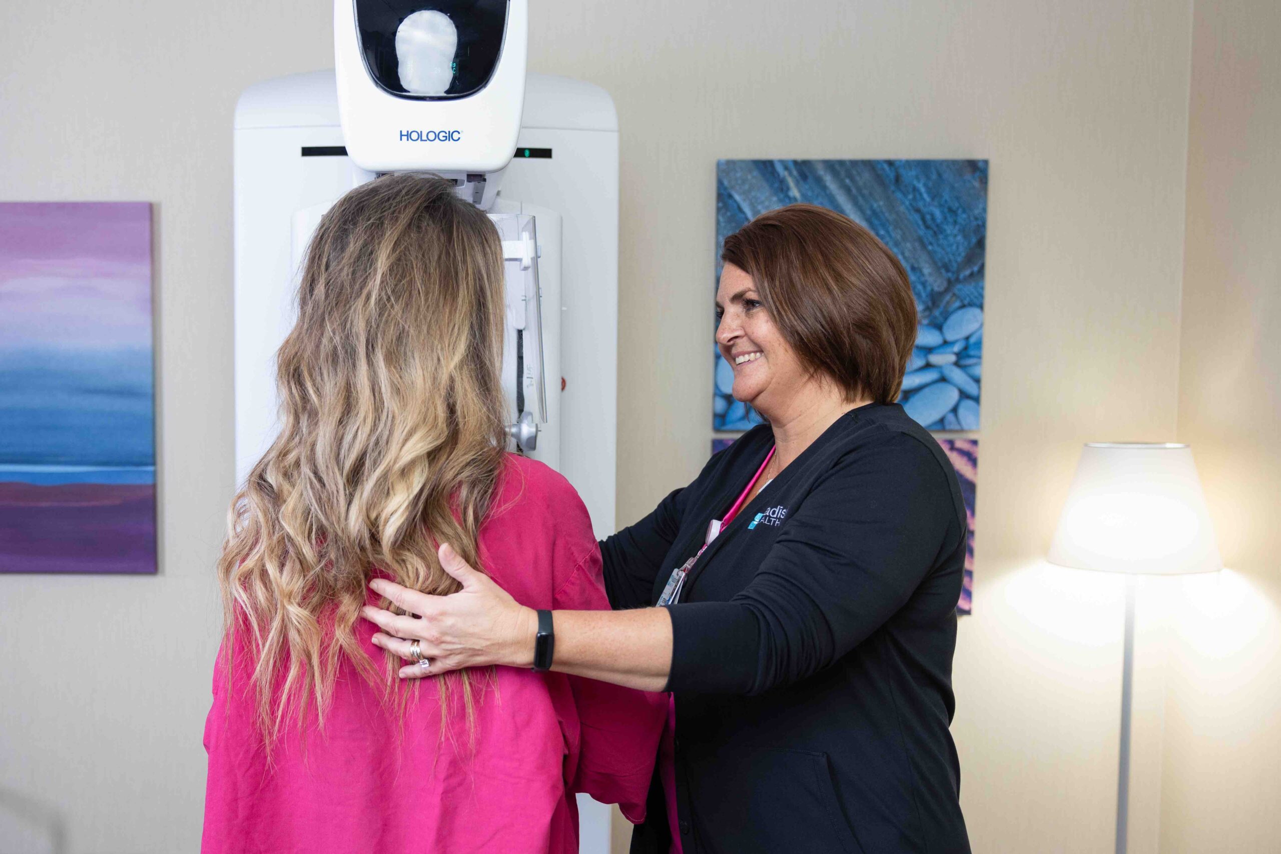 Woman getting mammogram